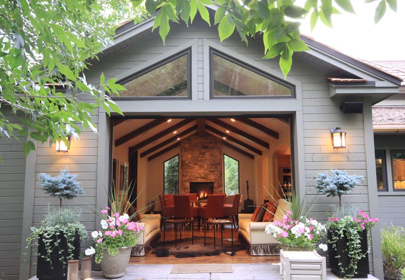 Looking through glass wall at new Living Room and Dining room